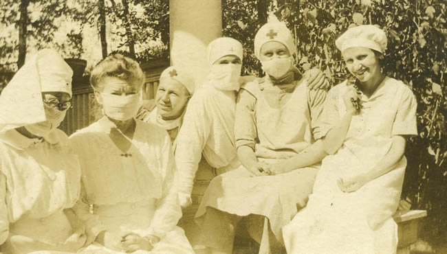Sepia toned photograph of nurses