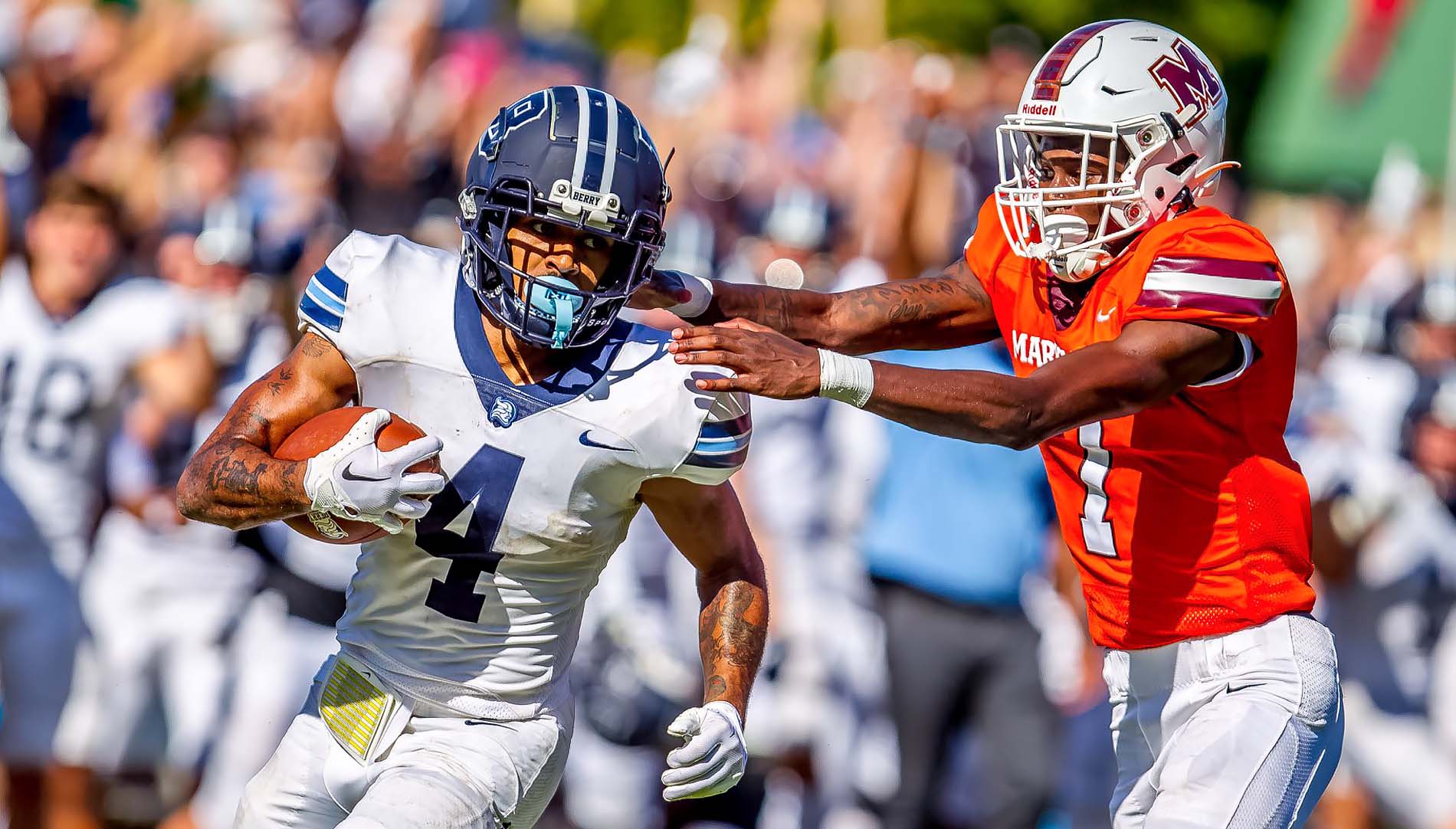 Deiondre Wilson running with football
