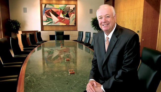 J. Barry Griswell in a conference room