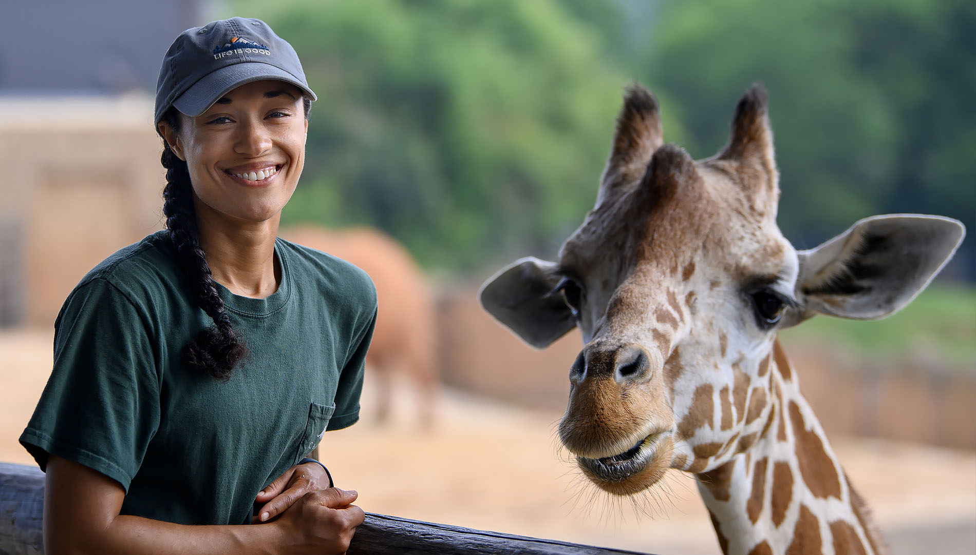 Kara Moss with giraffe