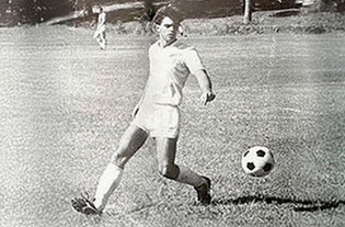 Richard Newell playing soccer during college days at Berry.