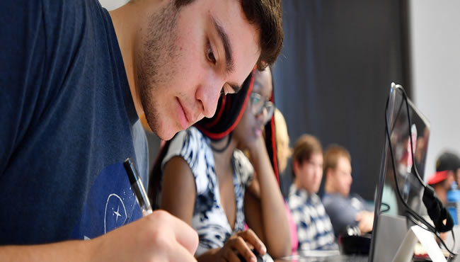 Students writing essays