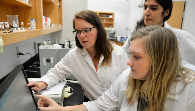 Students in lab coats
