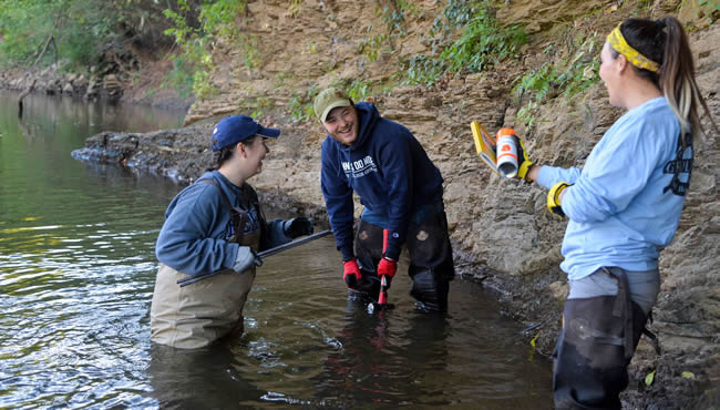 Students in a river