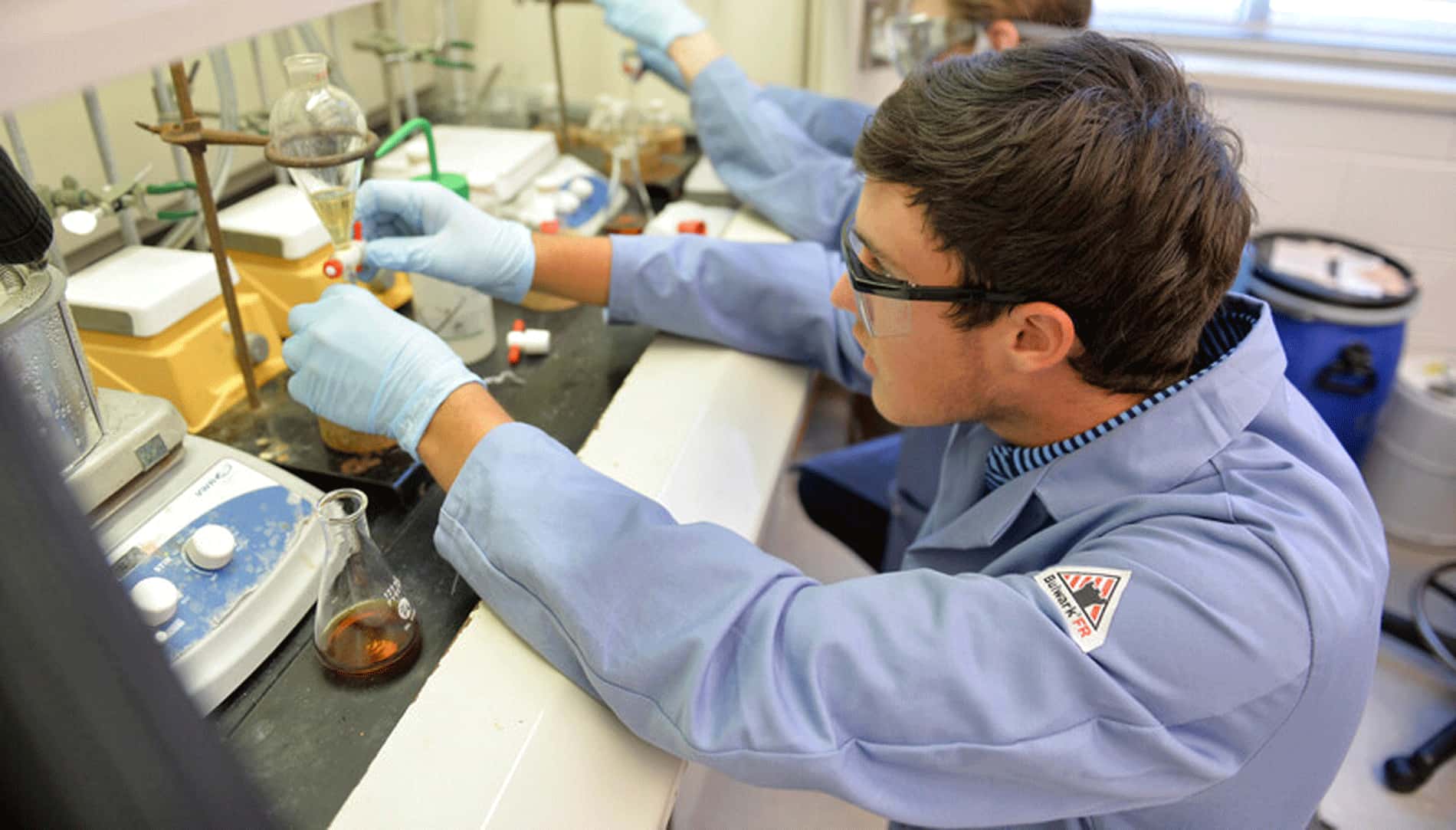 Student performing a lab experiment