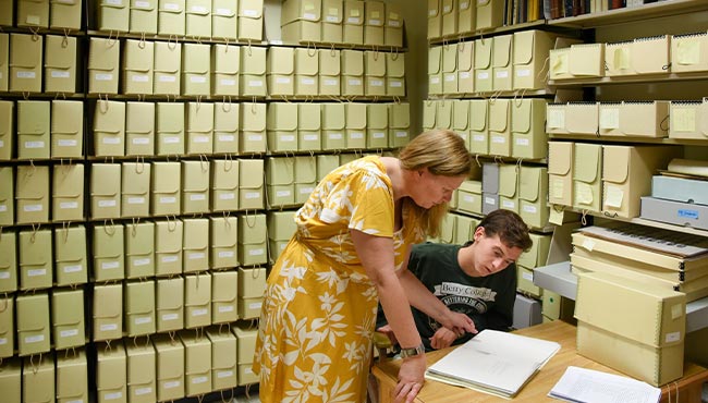 Students in an archive