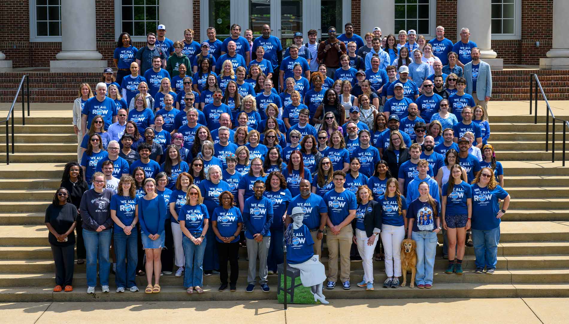 Berry College Faculty and Staff standing together on a staircase wearing matching shirts