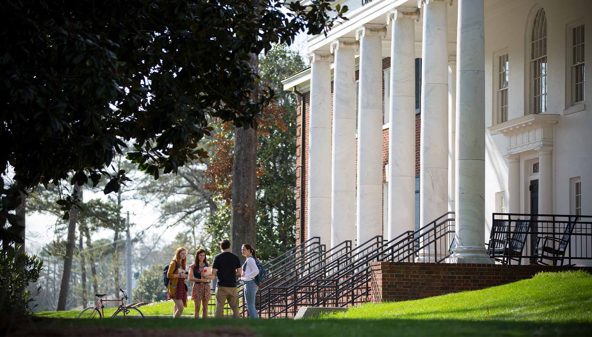 Three Berry students standing outside of Evans Hall