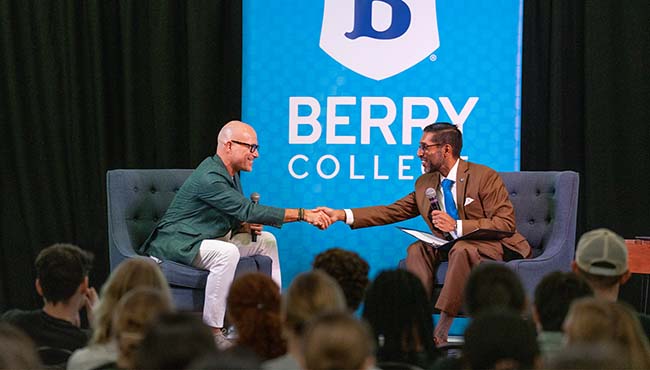 NACE CEO Shawn VanDerziel shakes hands with Berry College President Sandeep Mazumder