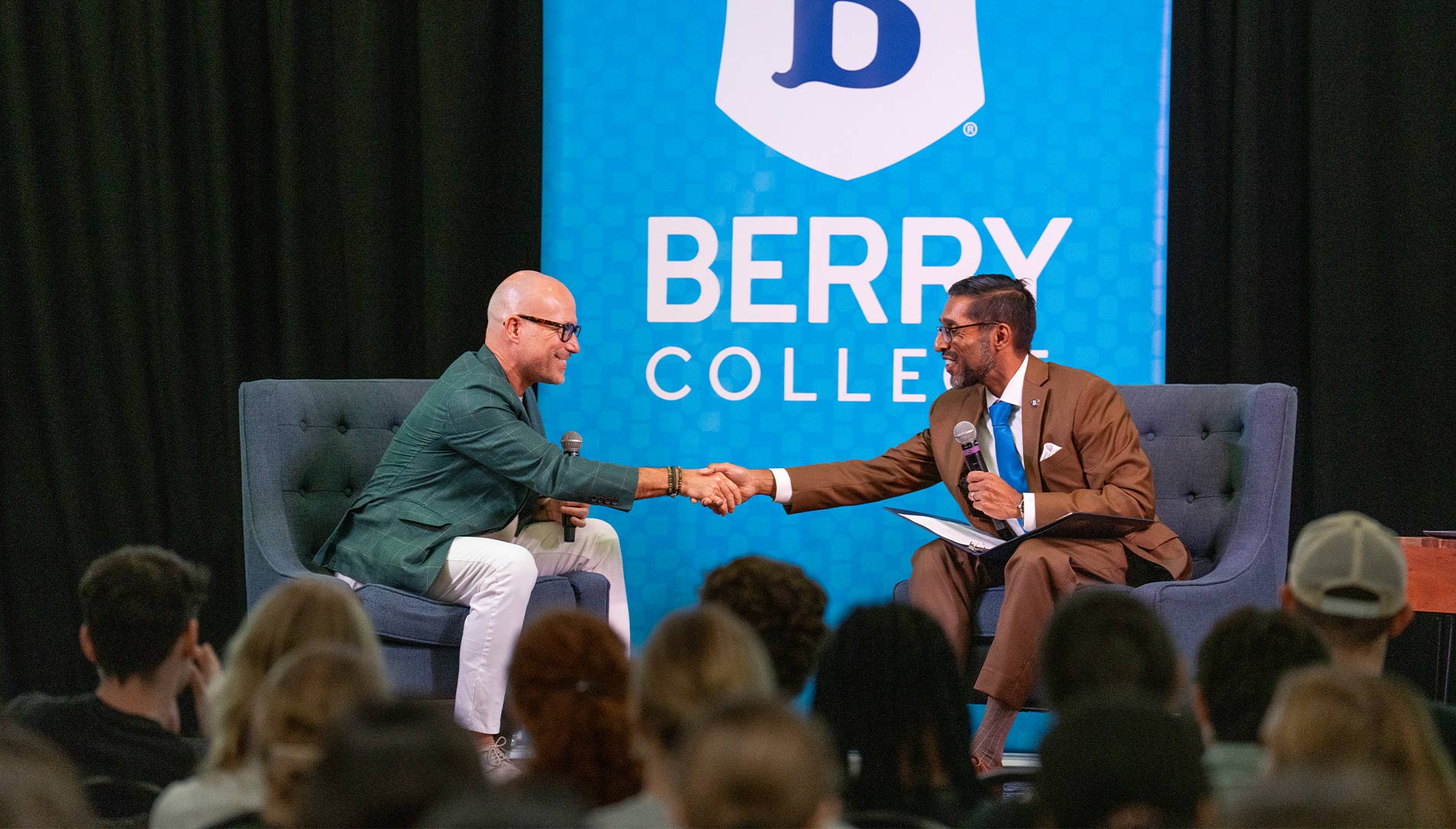 NACE CEO Shawn VanDerziel shakes hands with Berry College President Sandeep Mazumder