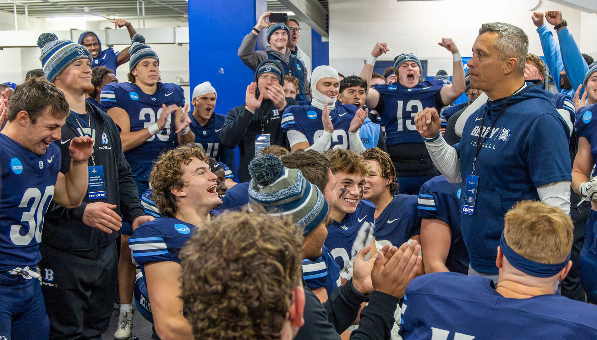 Tony Kunczewski giving speech to football team in locker room