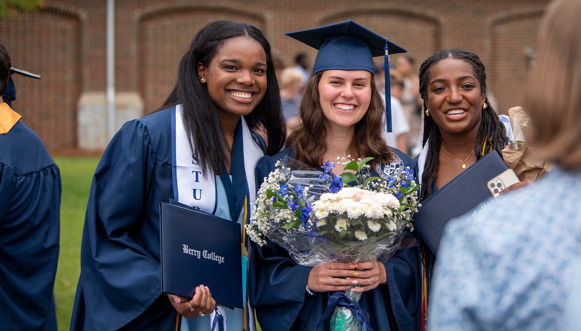 group of female graduates