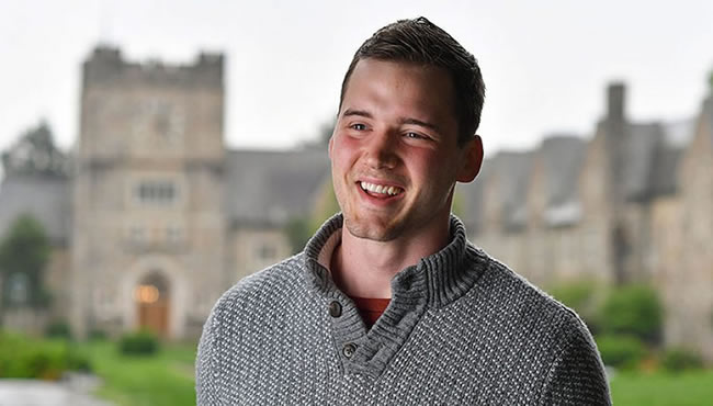 Jordan Blackmon in front of Ford Building