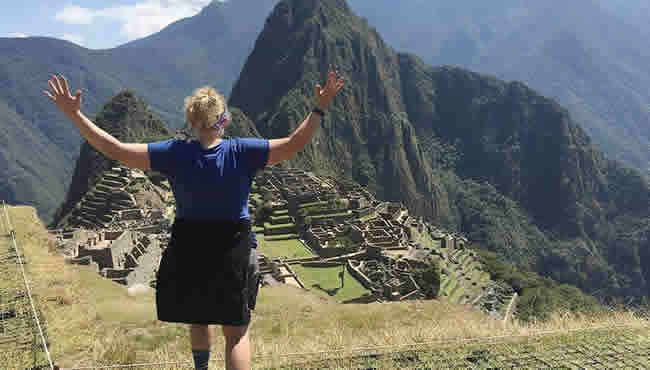 Laura Waitt atop a mountain