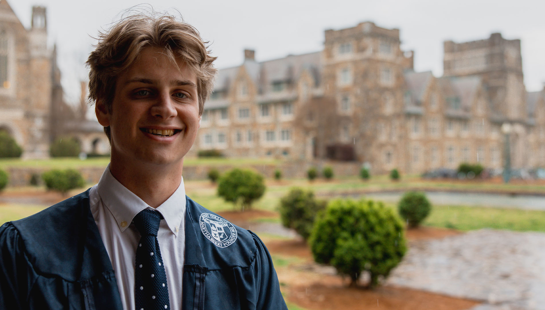 Sachal Denney in graduation robes