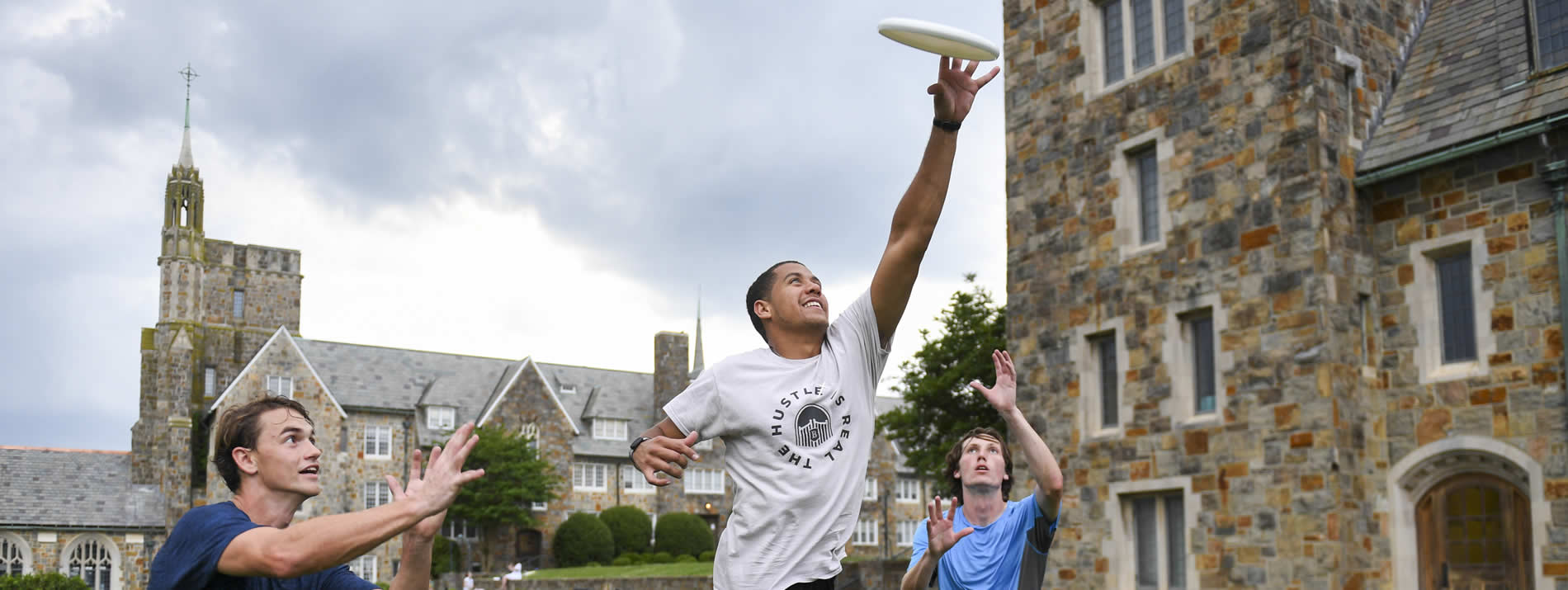 Students playing ultimate frisbee